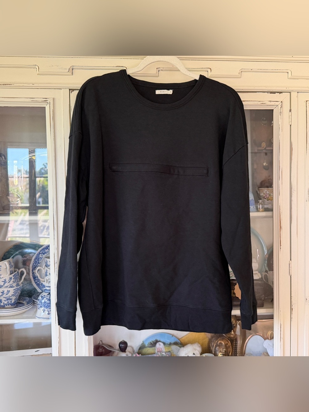 Casual Black Crewneck Sweatshirt with Minimal Chest Detail